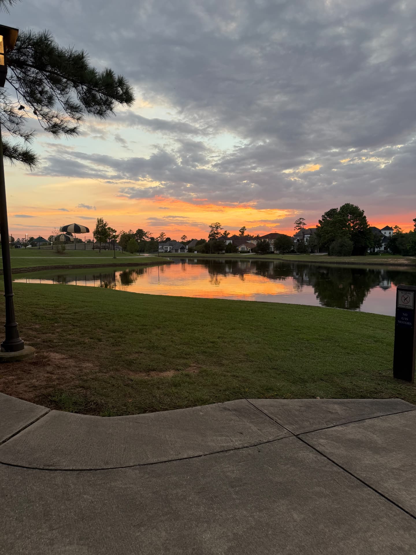 Sunset over Lake Paloma in The Woodlands, TX where Gen Zen holds SUP yoga classes